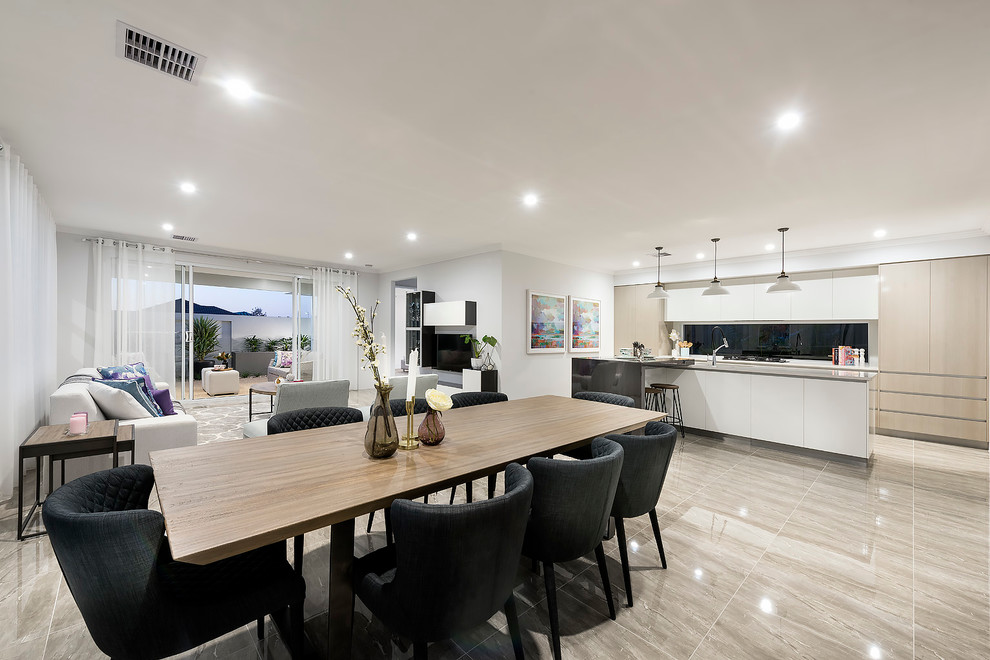 Idee per una sala da pranzo aperta verso il soggiorno moderna di medie dimensioni con pareti bianche e pavimento in gres porcellanato