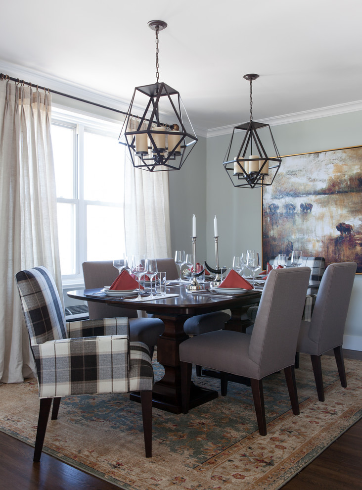 Inspiration for a medium sized traditional open plan dining room in New York with blue walls, dark hardwood flooring, no fireplace and brown floors.