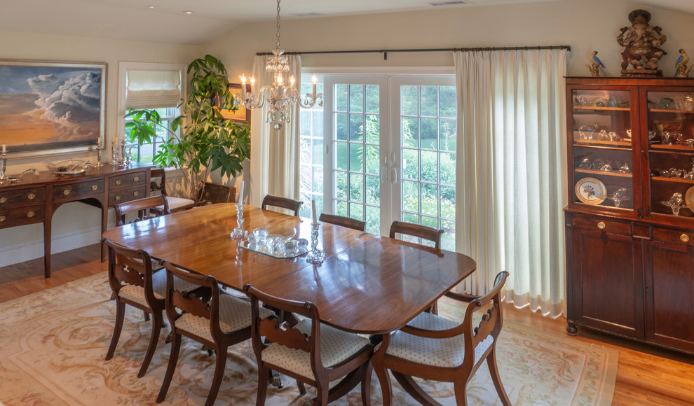 The porch is transformed into a formal dining room - Transitional