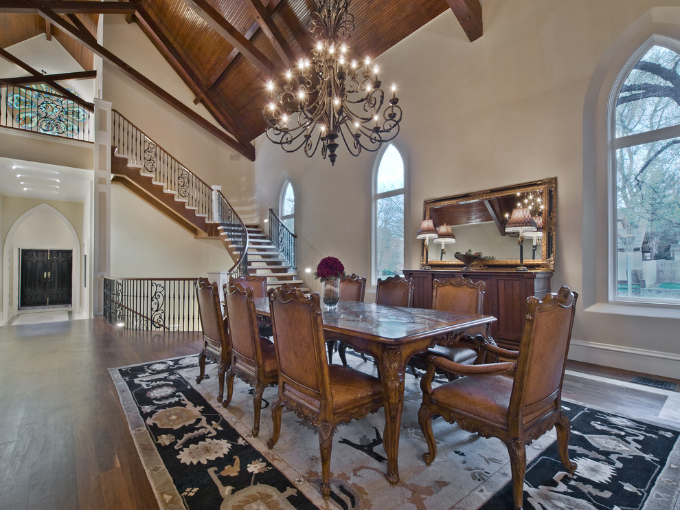 Example of a large classic dark wood floor great room design in Denver with beige walls