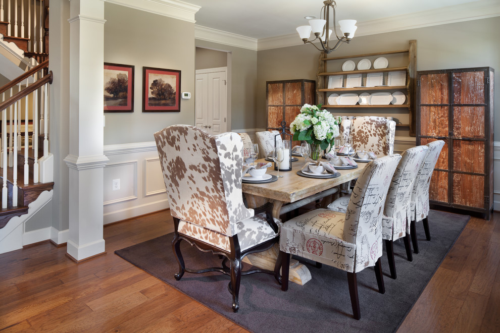 Example of a classic dark wood floor dining room design in DC Metro with gray walls