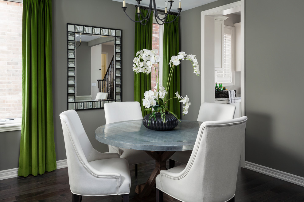 Traditional enclosed dining room in Toronto with grey walls and dark hardwood flooring.