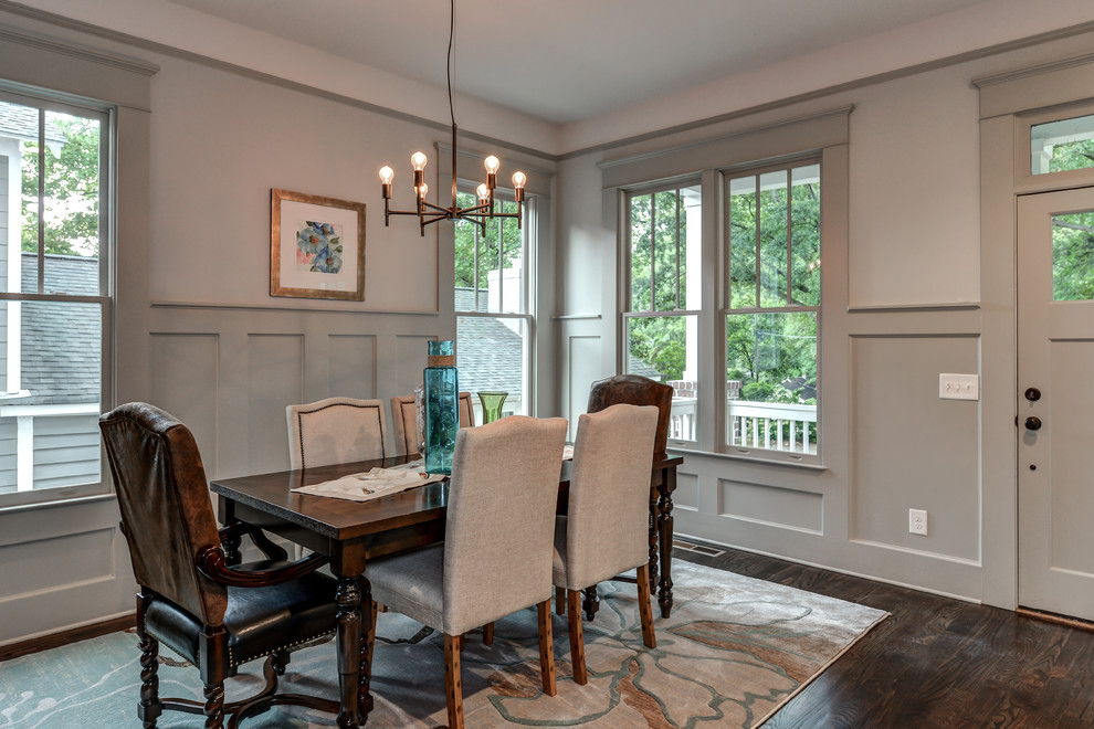 Small classic dining room in Atlanta with grey walls and dark hardwood flooring.