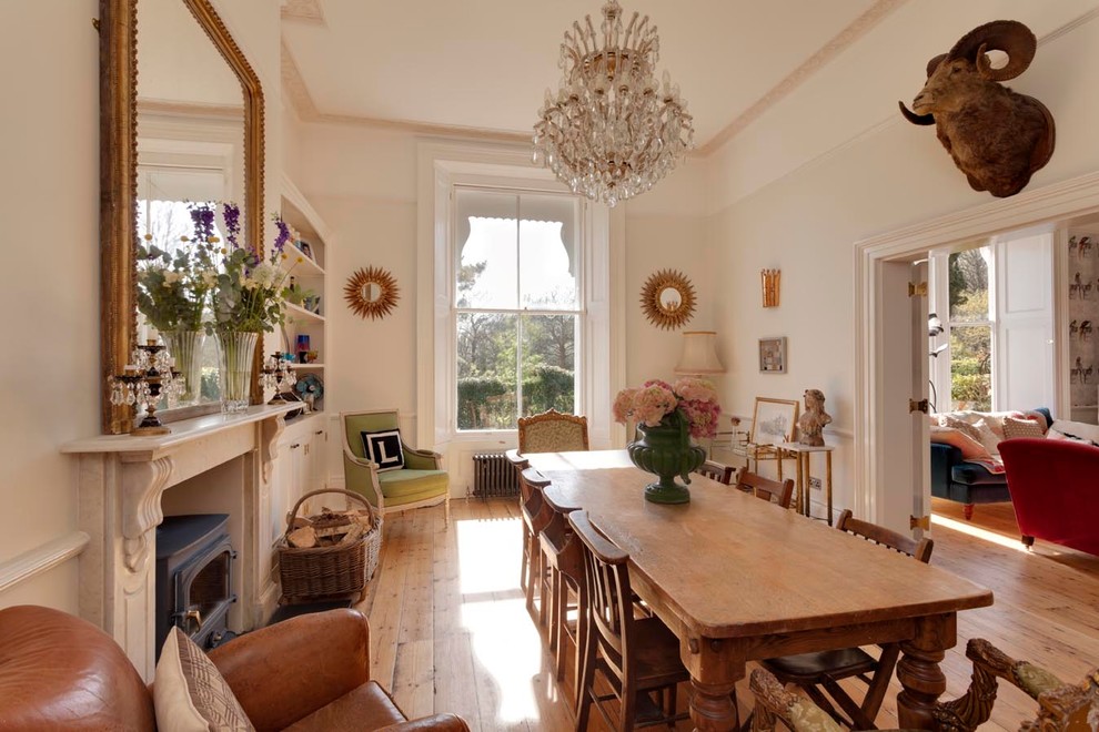Design ideas for a classic dining room in Sussex.