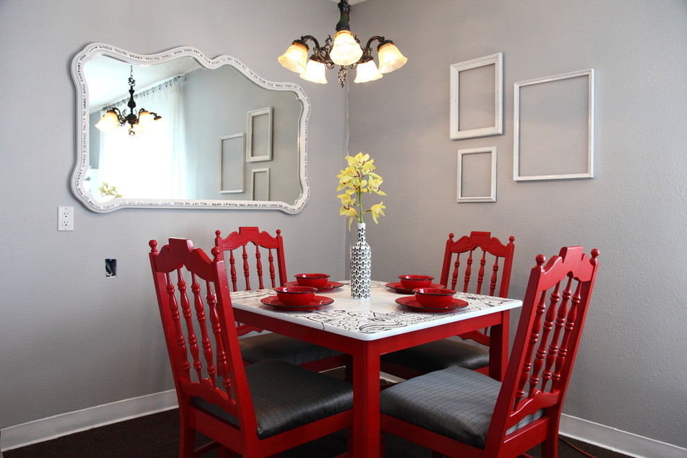 Inspiration for a timeless dark wood floor dining room remodel in Los Angeles with gray walls