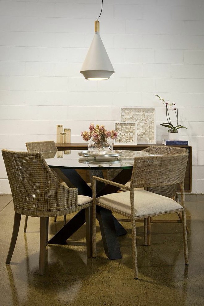 This is an example of a contemporary dining room in Brisbane.