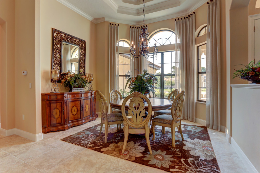 Small classic open plan dining room in Orlando with beige walls, ceramic flooring, no fireplace and beige floors.