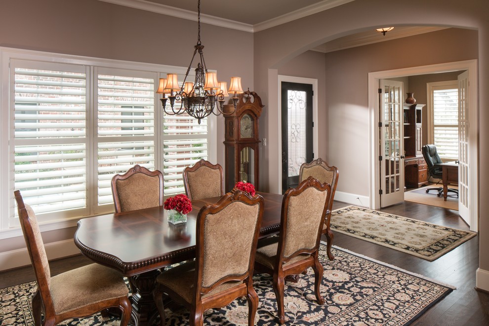 Inspiration for a small timeless dark wood floor dining room remodel in Houston