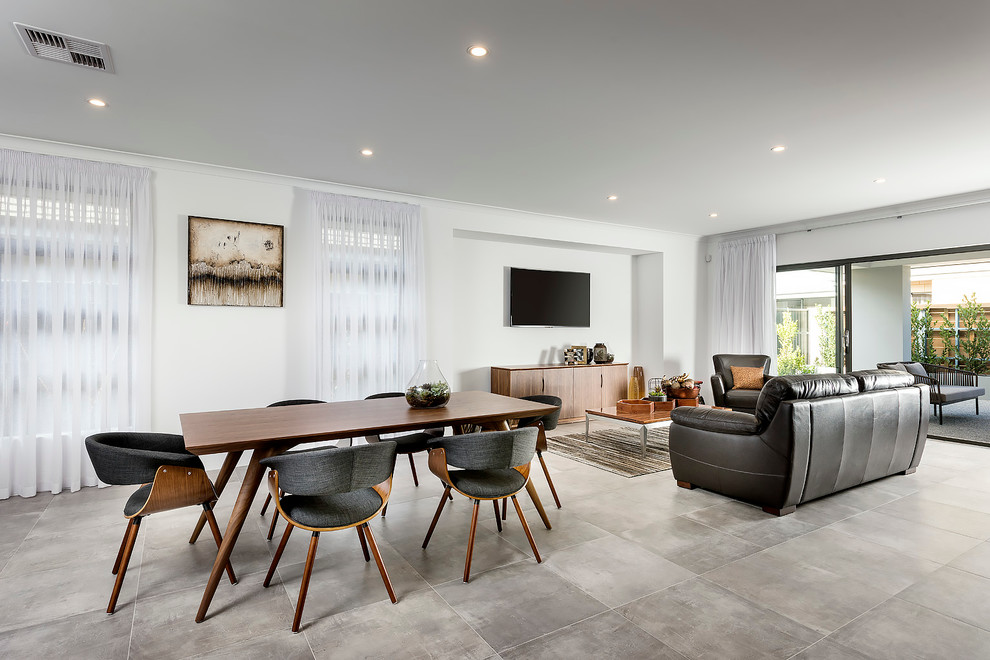 This is an example of a large contemporary kitchen/dining room in Perth with white walls and no fireplace.