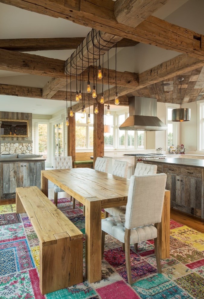 Photo of a rustic dining room in Minneapolis with white walls and dark hardwood flooring.