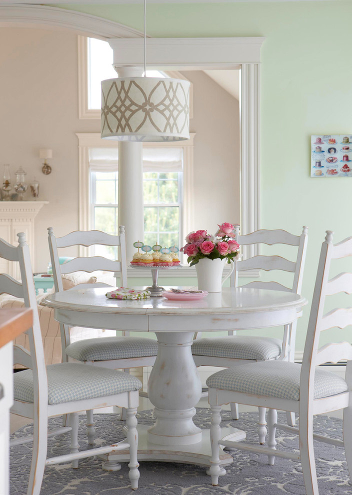 Inspiration for a mid-sized coastal carpeted enclosed dining room remodel in Tampa with green walls and no fireplace
