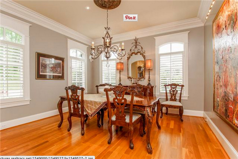 Design ideas for a medium sized traditional enclosed dining room in Nashville with grey walls and medium hardwood flooring.