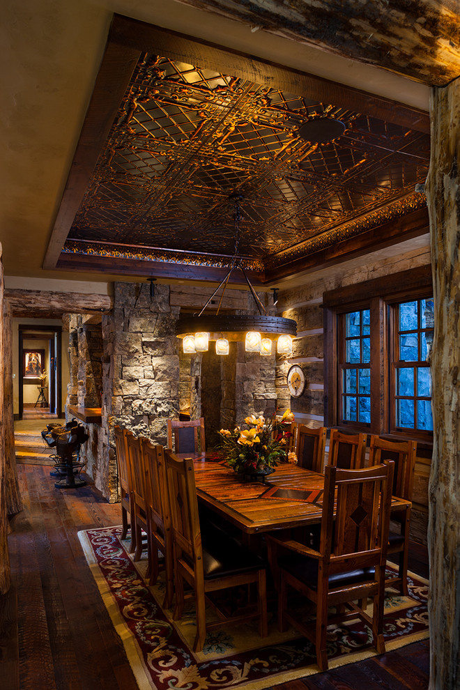 Dining room - traditional dark wood floor dining room idea in Other