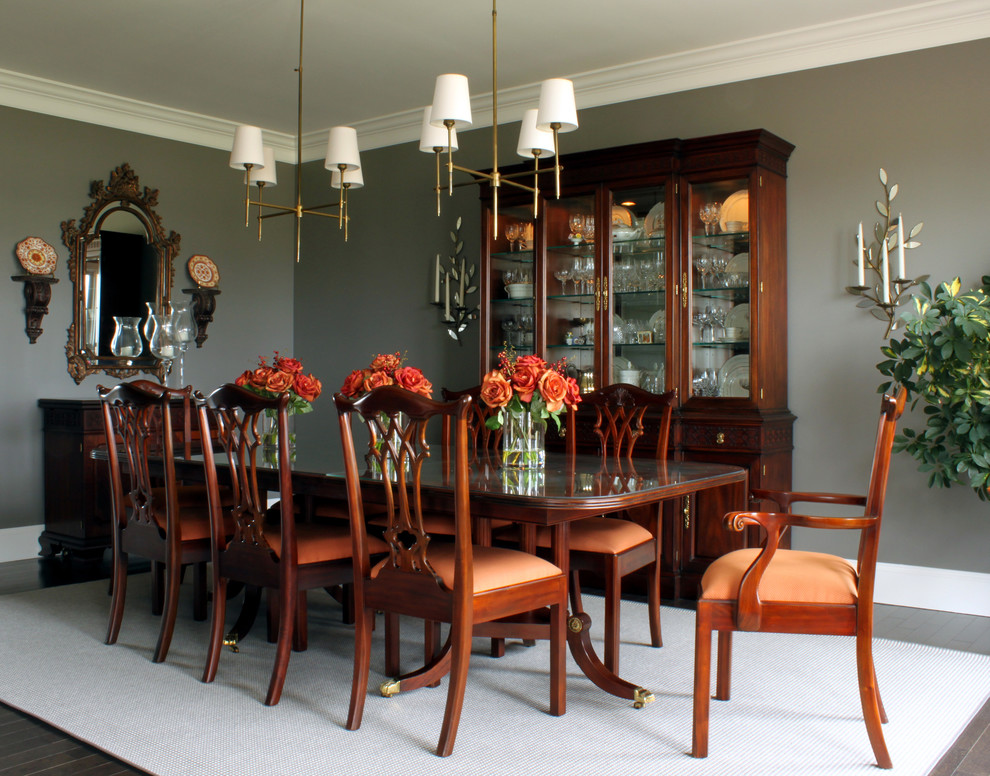 Dining room - traditional dark wood floor dining room idea in Chicago with gray walls