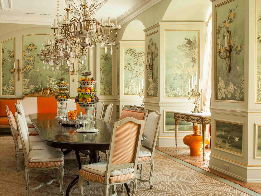 This is an example of a traditional dining room in San Francisco with green walls and carpet.