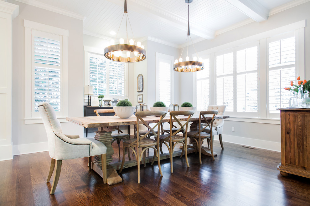 Photo of a classic dining room in Portland with grey walls, dark hardwood flooring and feature lighting.