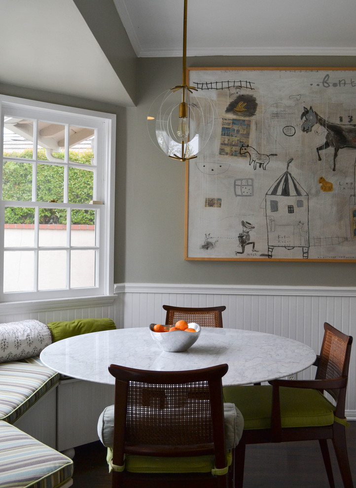 Dining room - transitional dining room idea in Los Angeles with gray walls