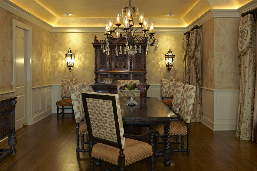 Inspiration for a large traditional enclosed dining room in New York with beige walls, medium hardwood flooring and no fireplace.