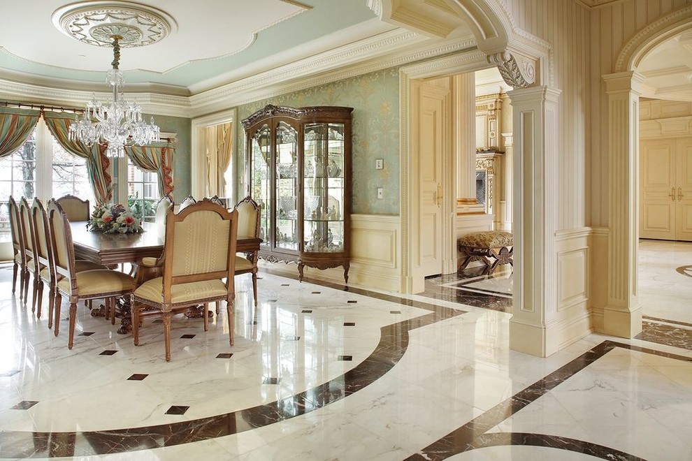 Large elegant marble floor and beige floor enclosed dining room photo in New York with green walls and no fireplace