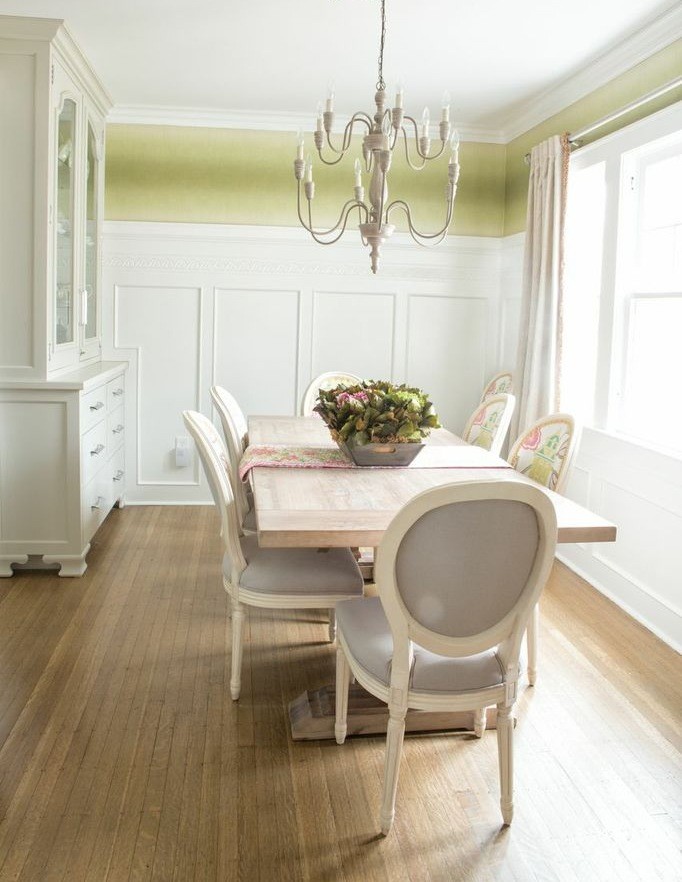 Inspiration for a medium sized classic enclosed dining room in Indianapolis with green walls, medium hardwood flooring and no fireplace.