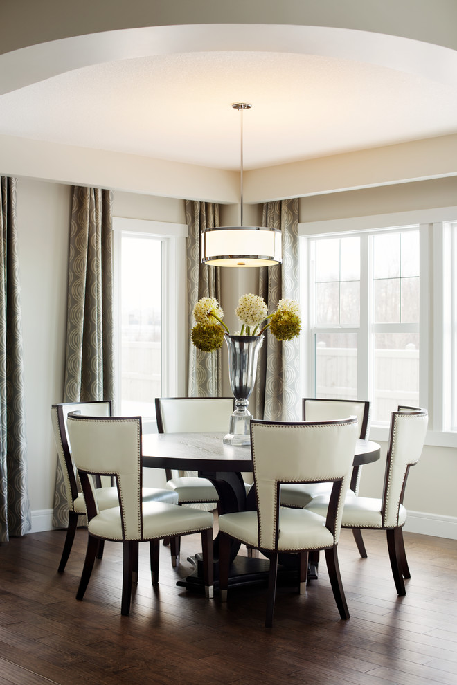 Design ideas for a classic dining room in Edmonton with white walls and dark hardwood flooring.