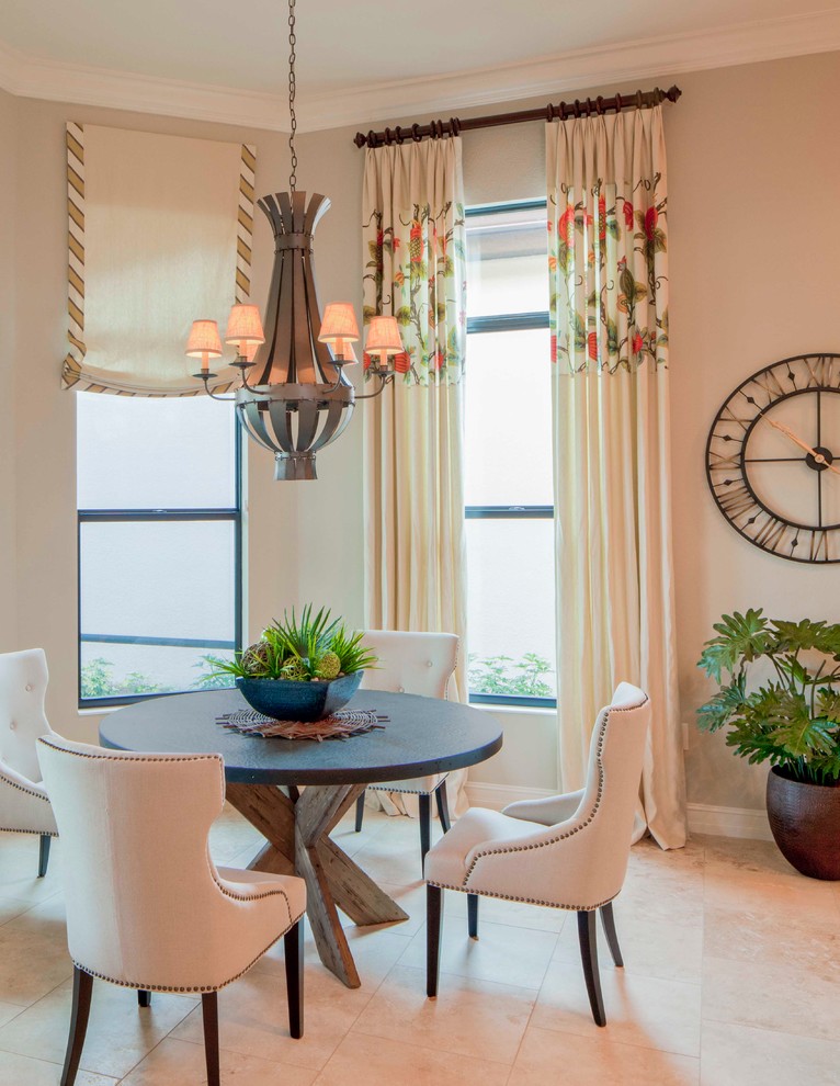 Dining room - transitional dining room idea in Miami with beige walls