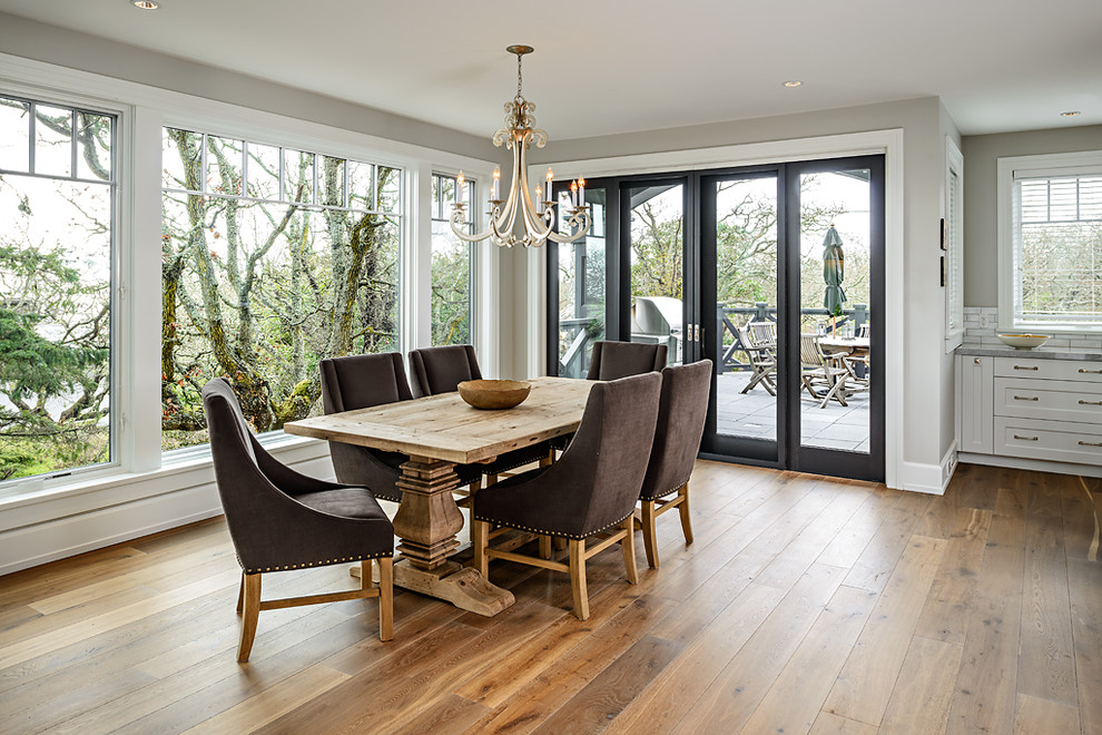 Example of a transitional dark wood floor kitchen/dining room combo design in Vancouver with gray walls