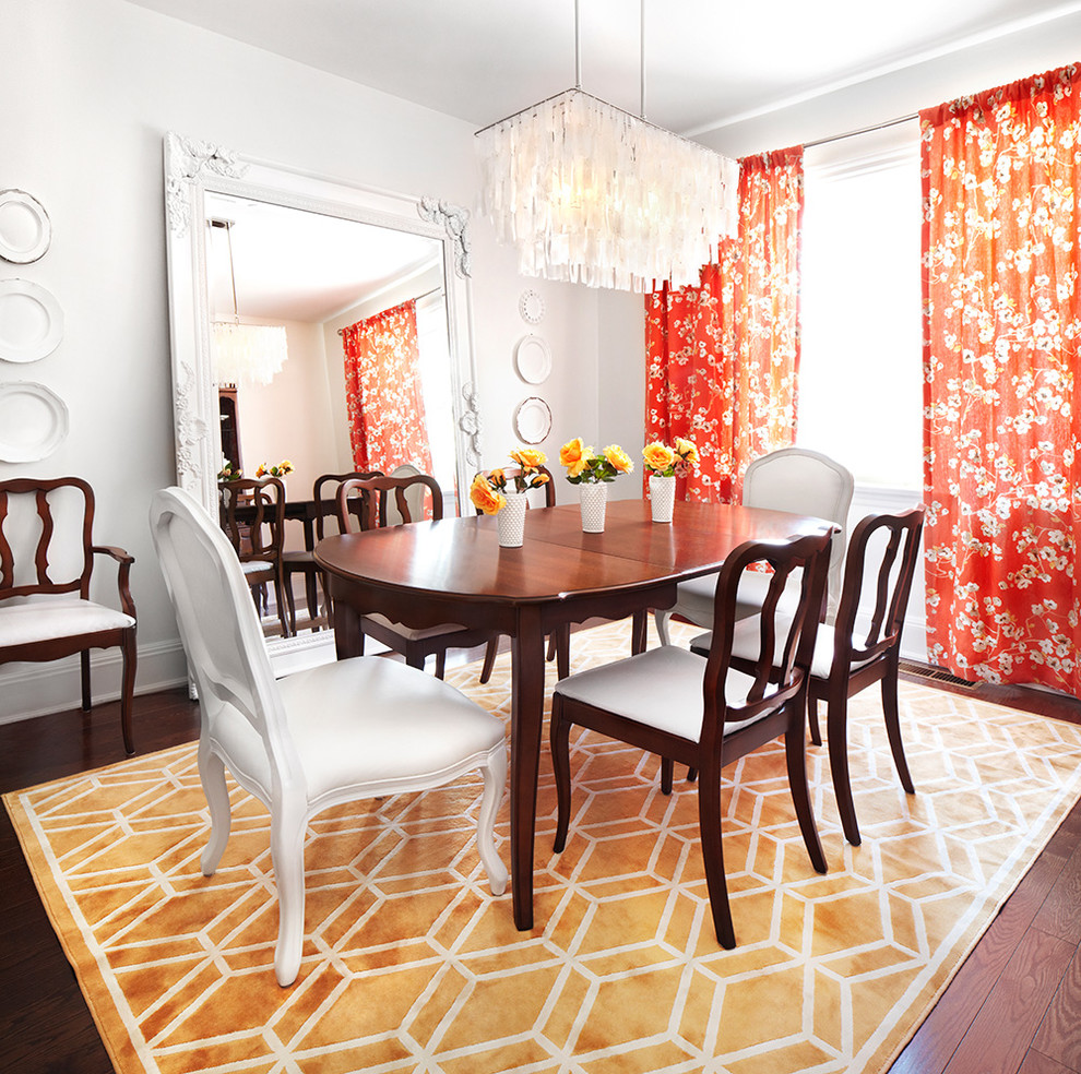 Inspiration for a traditional dining room in Dallas with white walls and dark hardwood flooring.