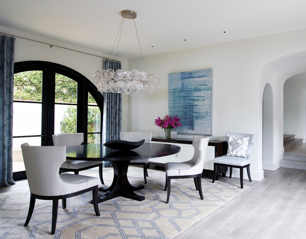 Classic dining room in Orange County with white walls.