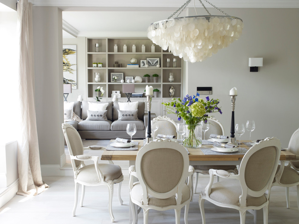 This is an example of a classic dining room in London with beige walls.