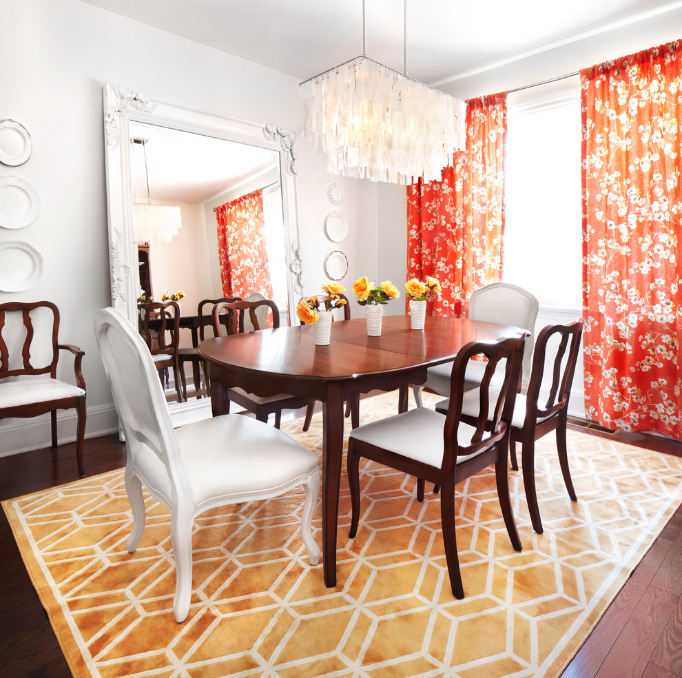 Design ideas for a classic dining room in Toronto with white walls and dark hardwood flooring.
