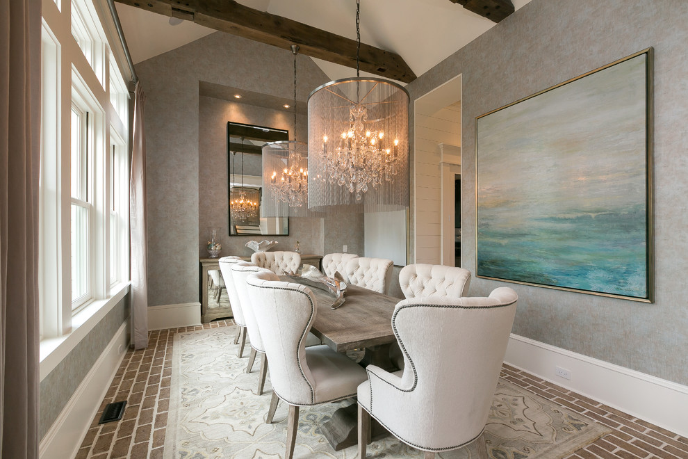 Traditional dining room in Charleston with grey walls and brown floors.