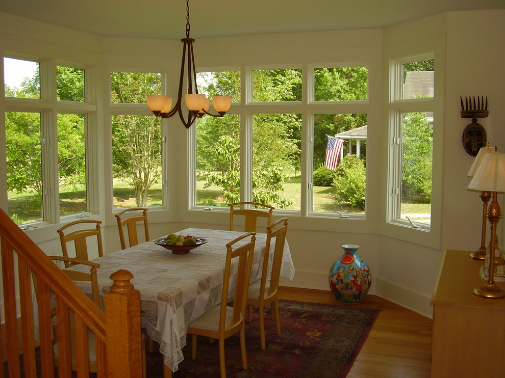 Example of a transitional dining room design in Charlotte
