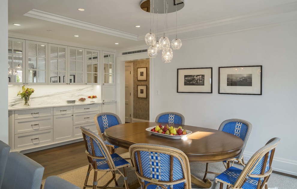 Medium sized traditional kitchen/dining room in Boston with white walls.
