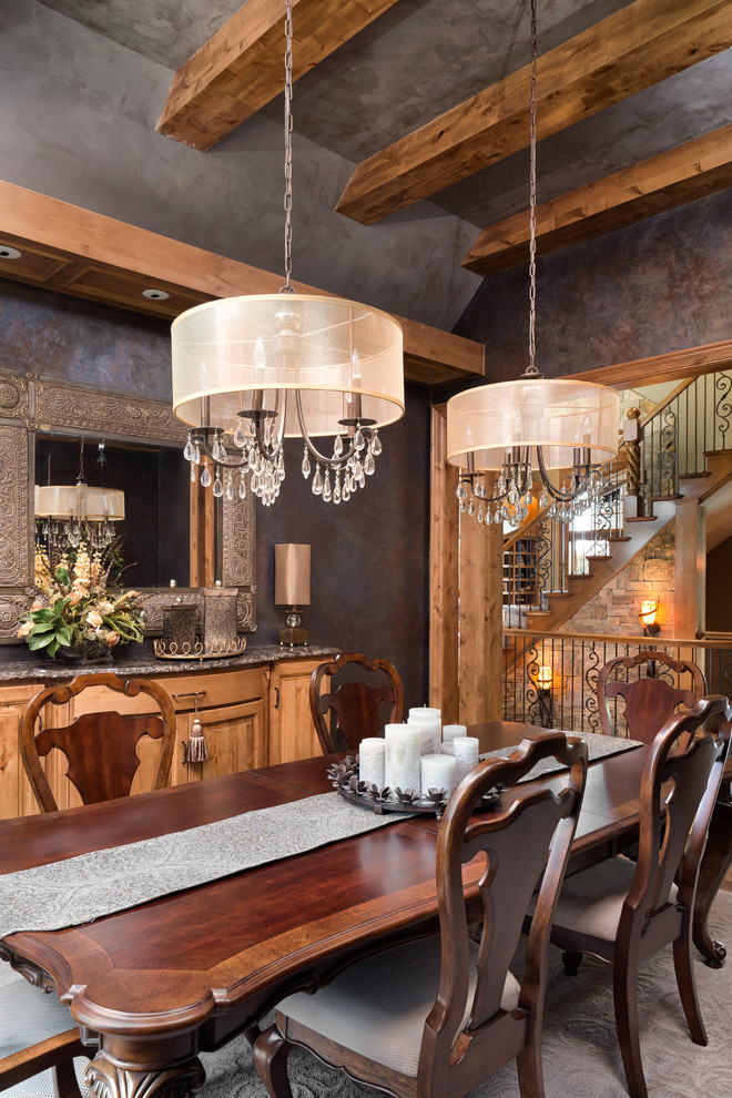 Large rustic enclosed dining room in Kansas City with multi-coloured walls, carpet and no fireplace.