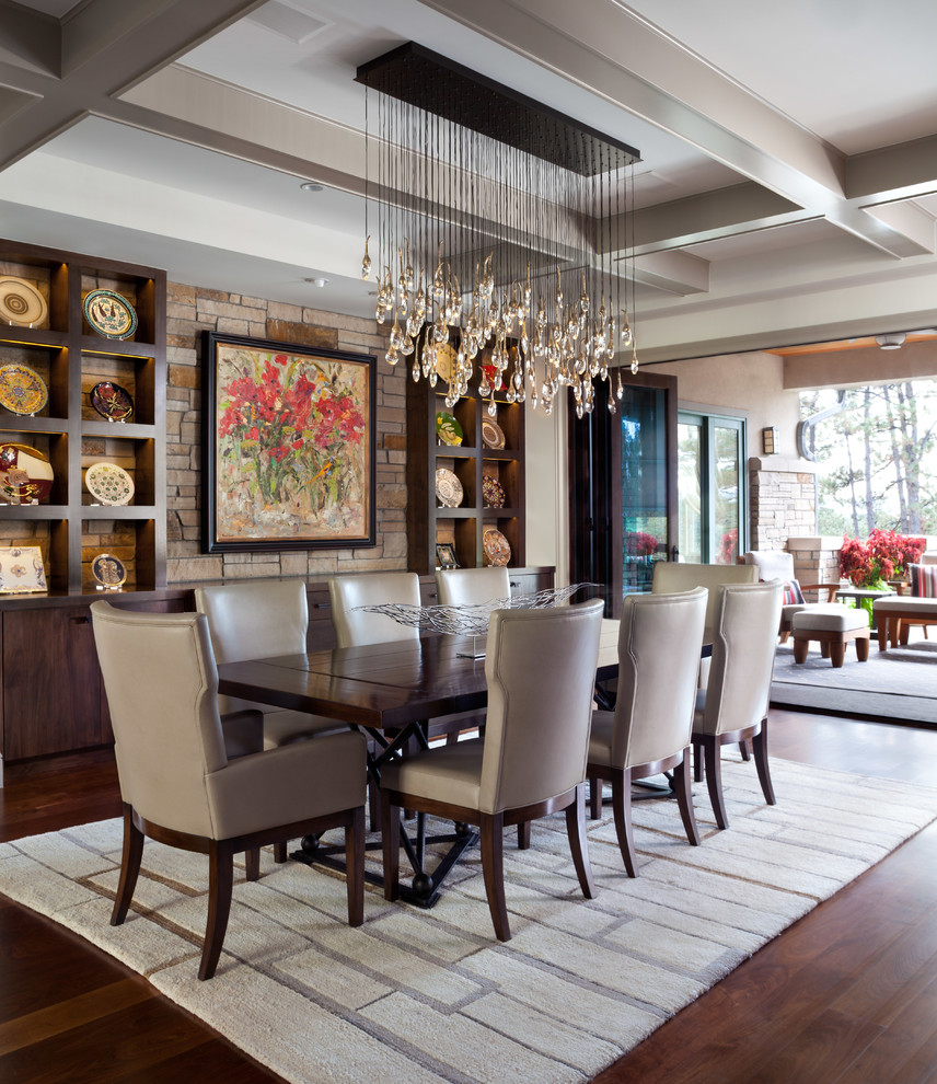 Design ideas for a classic dining room in Denver with dark hardwood flooring and brown floors.