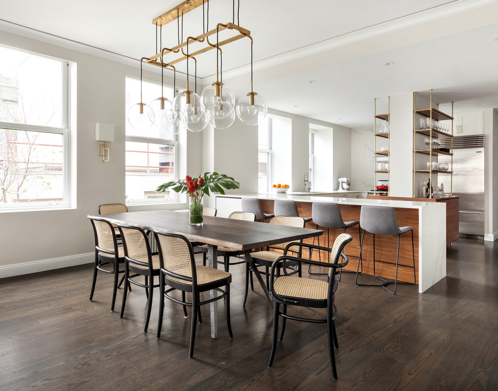 Photo of a scandinavian kitchen/dining room in New York with grey walls, dark hardwood flooring and no fireplace.