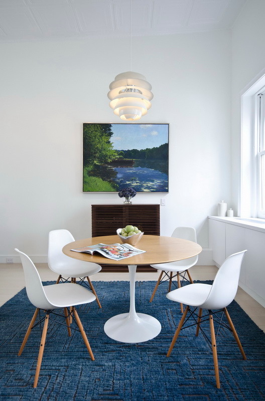 This is an example of a scandinavian dining room in New York.