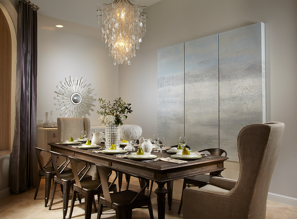 Inspiration for a large contemporary marble floor dining room remodel in Miami with beige walls and no fireplace