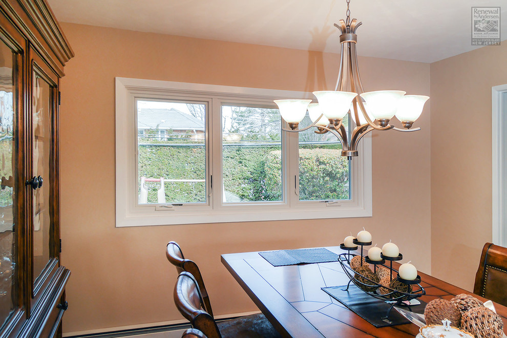 Photo of a medium sized enclosed dining room in Newark with beige walls.