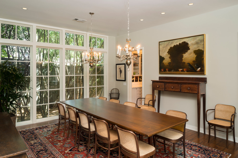 Inspiration for a large craftsman medium tone wood floor and brown floor enclosed dining room remodel in Houston with gray walls and no fireplace