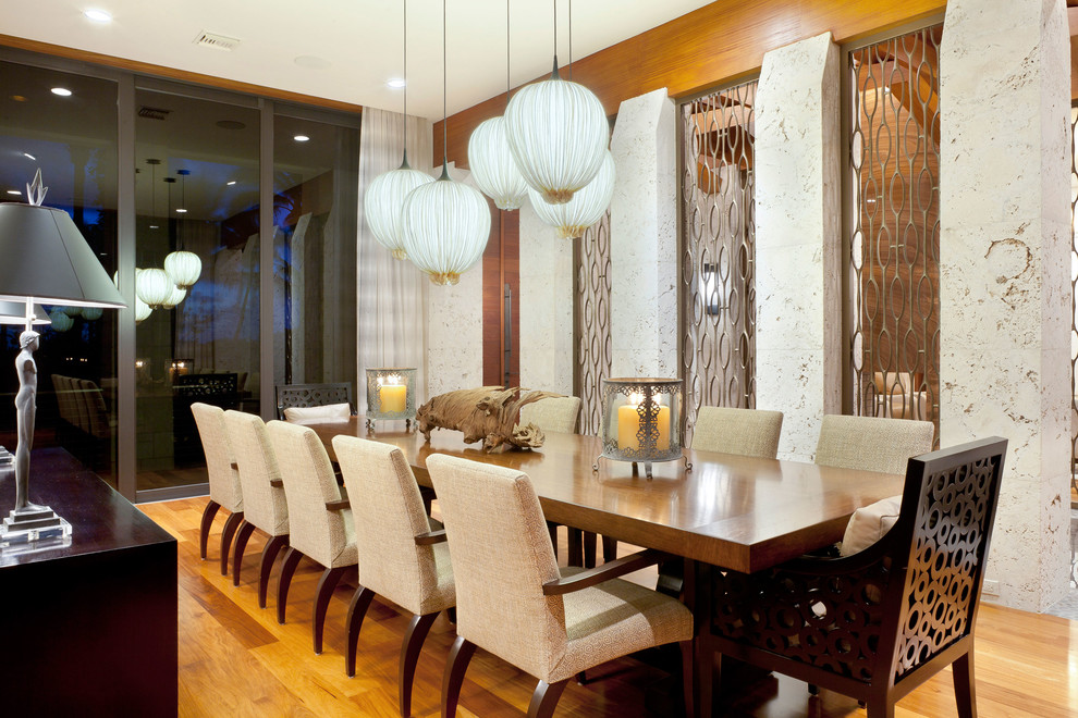 Design ideas for a medium sized world-inspired dining room in Other with light hardwood flooring.