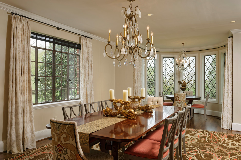 Photo of a classic dining room in DC Metro with beige walls, dark hardwood flooring and no fireplace.