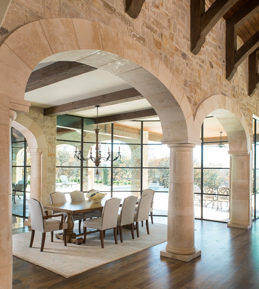Inspiration for a huge mediterranean medium tone wood floor great room remodel in Dallas