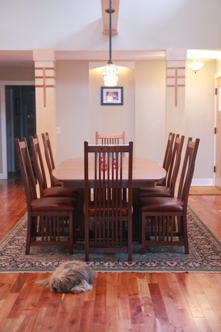 Dining room - contemporary medium tone wood floor dining room idea in Grand Rapids with beige walls