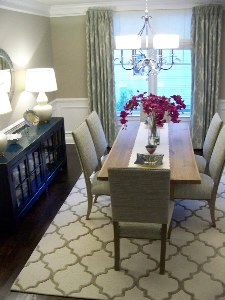 Large transitional dark wood floor and brown floor dining room photo in New York with beige walls