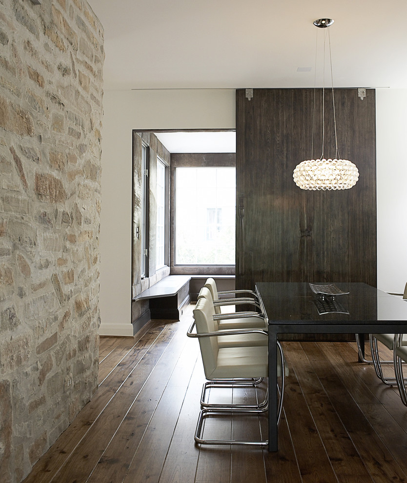 Trendy dark wood floor dining room photo in Chicago with white walls
