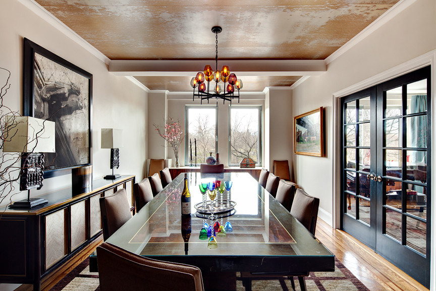 Huge transitional light wood floor enclosed dining room photo in New York with beige walls and no fireplace