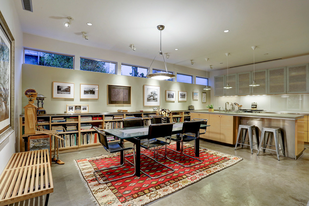 Источник вдохновения для домашнего уюта: кухня-столовая среднего размера в стиле модернизм с белыми стенами и бетонным полом без камина