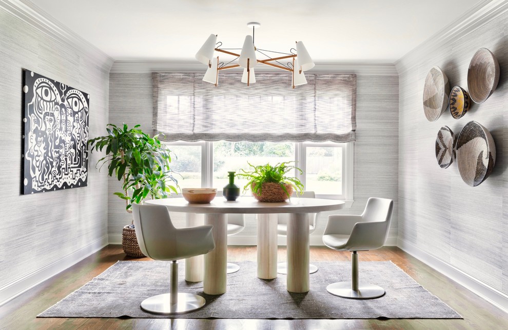 Photo of a bohemian open plan dining room in New York with grey walls.